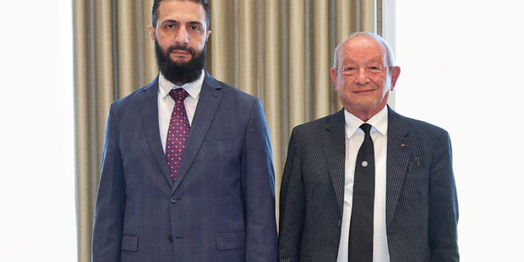 نجيب ساويرس واحمد الشرع